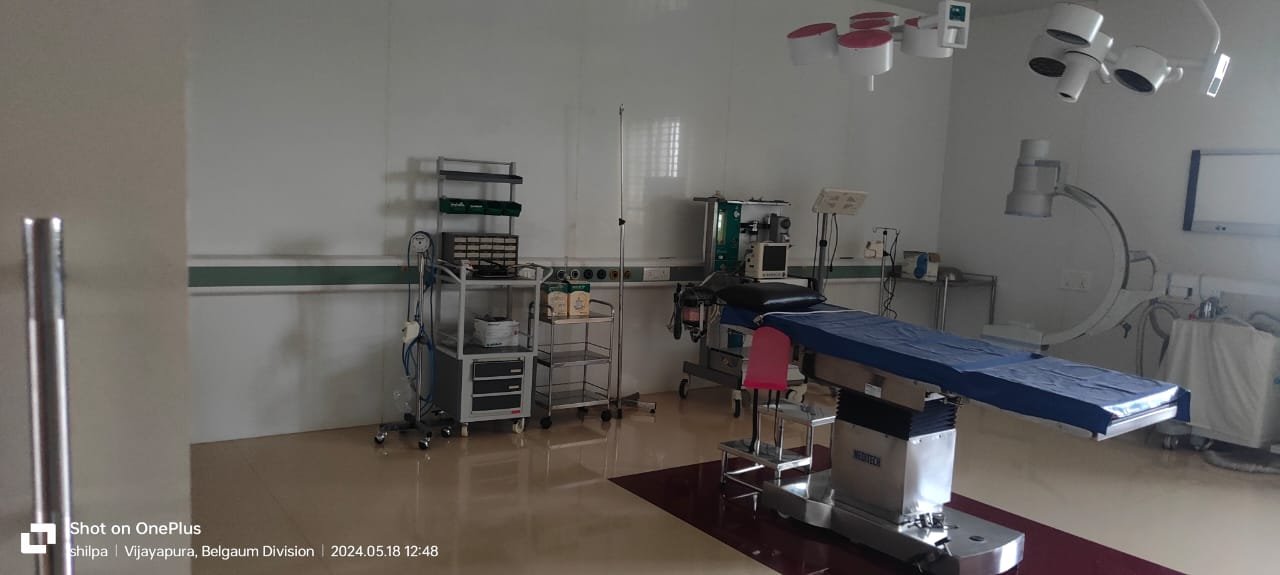 Operation theatre at Spandana Super Speciality Hospital with surgical lights and equipment